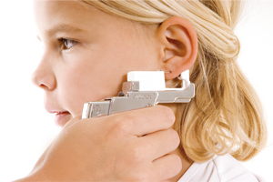 Ear piercing with Studex System75 — hygienic and barely noticeable